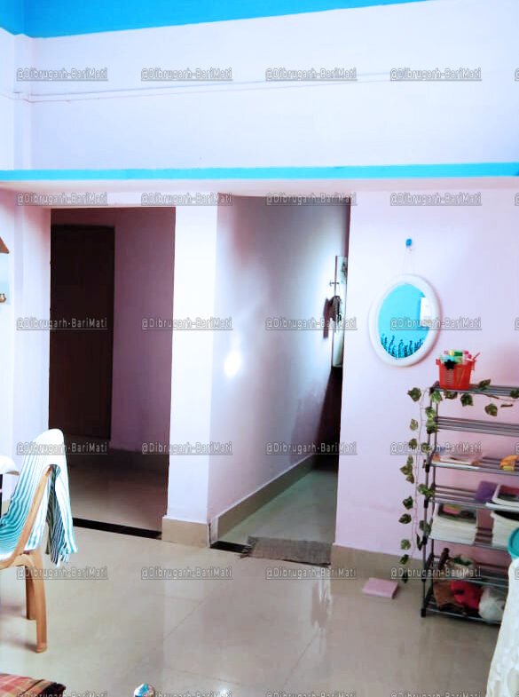 Spacious and well-lit 1 BHK house for rent near the AMC in Dibrugarh for under 8000 rupees.