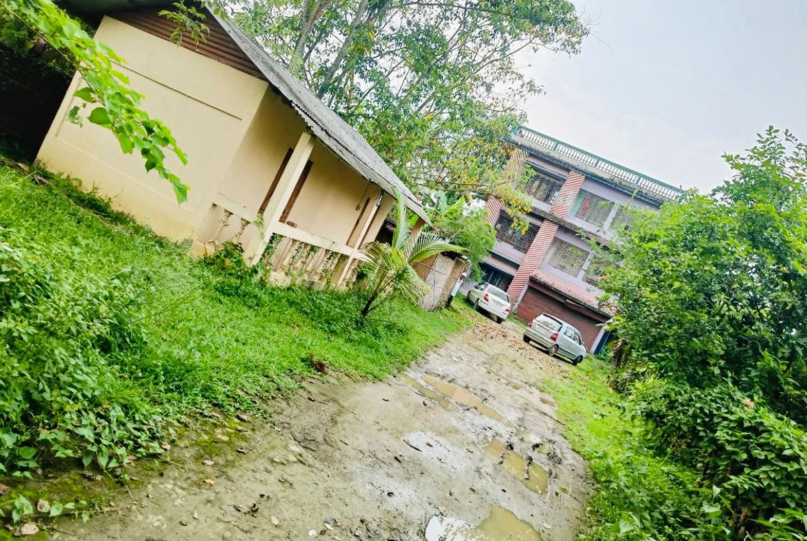 Spacious 3-story building available for sale at Ashok Path, Dorikapar, Sivasagar, main town, under ₹1 crore