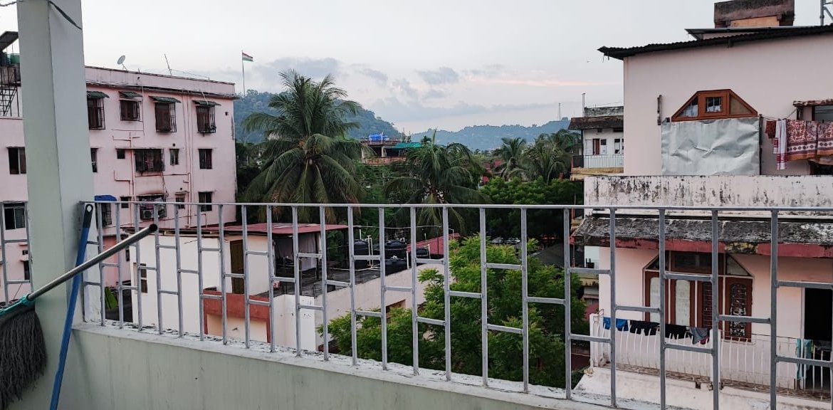 Modern 2 BHK fully furnished apartment for rent at Bhangagarh, Guwahati, with amenities like AC, modular kitchen, and king-size bed for ₹20,000 monthly