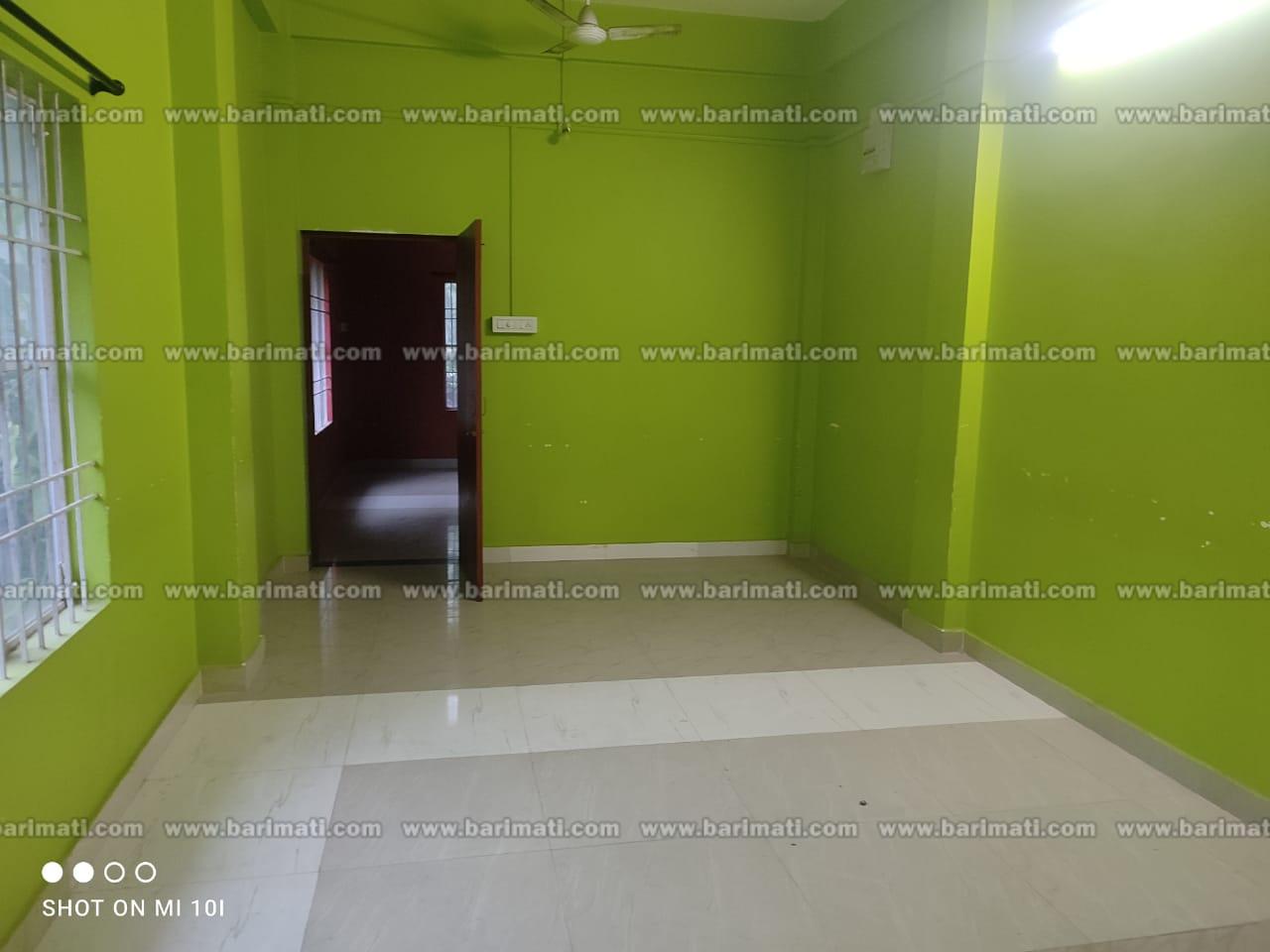 Budget-friendly 2BHK rental apartment in Milan Nagar, Dibrugarh, ground floor with car parking, located in a prime residential area.