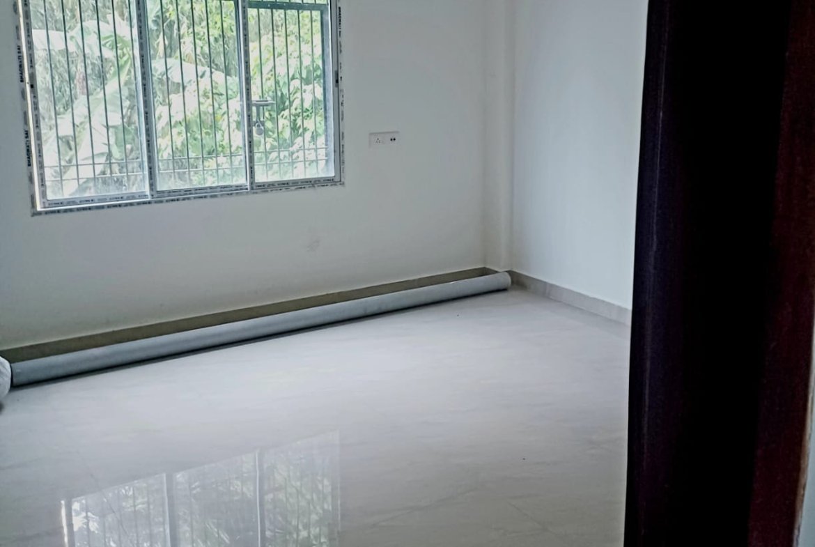 Spacious and affordable 2BHK house with 2 bathrooms for rent in Rongpuria, Tinsukia, at a prime first-floor location for ₹14,000