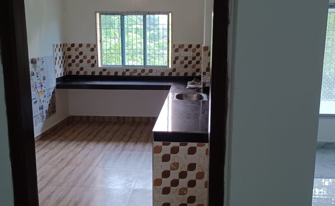 Well-maintained 2BHK house with 2 bathrooms for rent at Rongpuria, Tinsukia, at ₹14,000, located on the first floor in a prime area