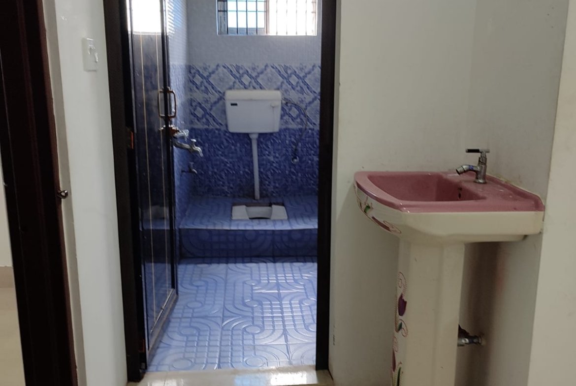 Comfortable 2 BHK house for rent at Podum Nagar, Dibrugarh, with 2 bathrooms, near educational institutions and AMC, in a prime location under ₹10,000
