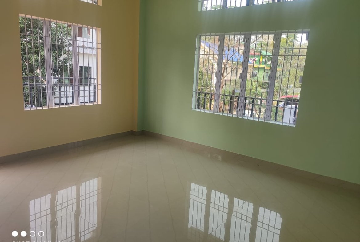 3BHK house for rent in Milan Nagar, Dibrugarh, first-floor property with a parking facility, located in the city's prime area under Rs 10,000
