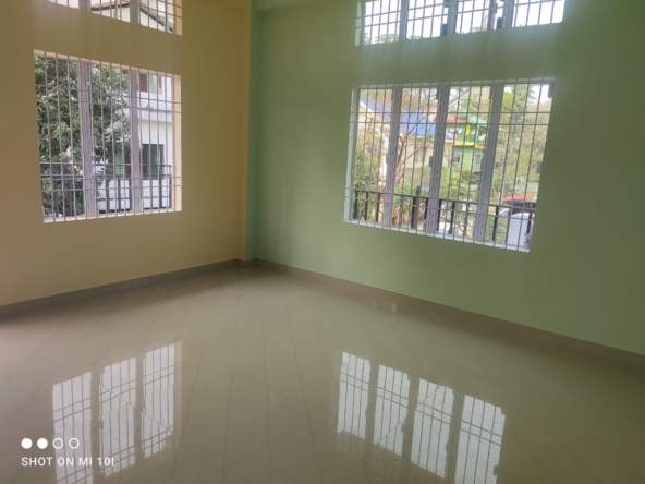 3BHK house for rent in Milan Nagar, Dibrugarh, first-floor property with a parking facility, located in the city's prime area under Rs 10,000