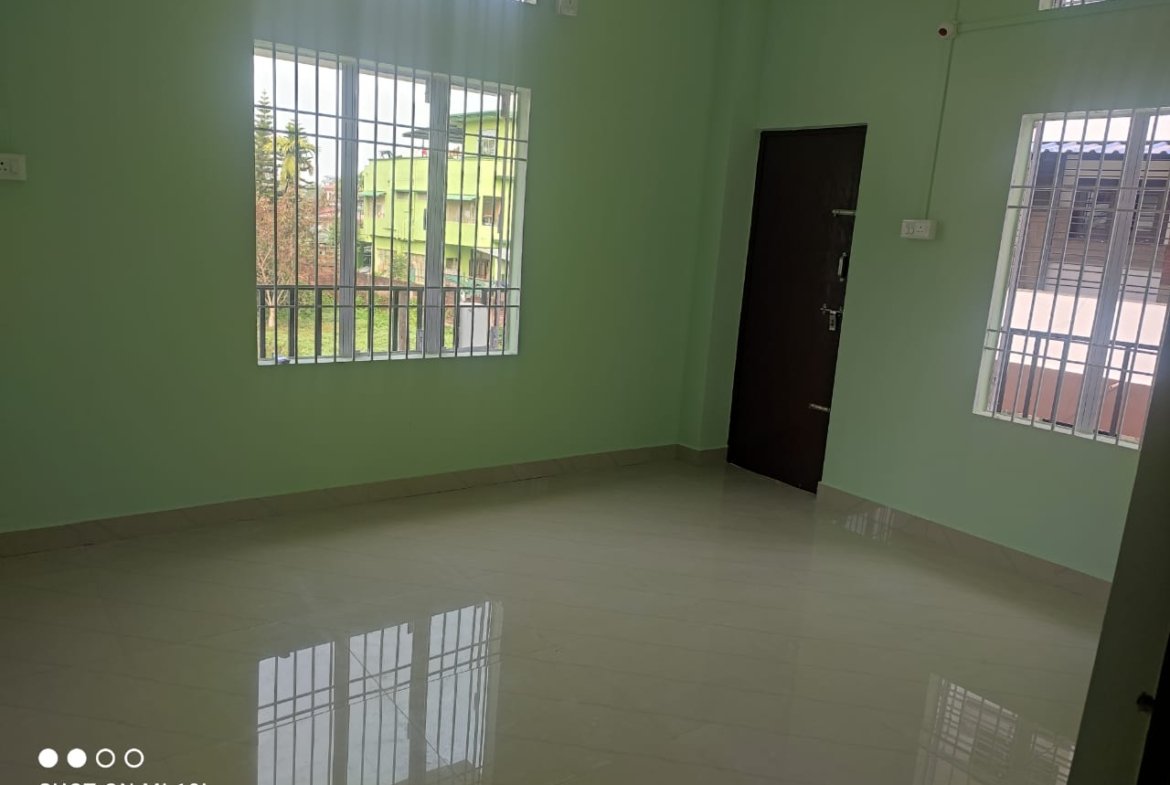 Well-ventilated 3BHK rental house at Milan Nagar, Dibrugarh, offering first-floor living, car parking, and a prime town location for Rs 10,000