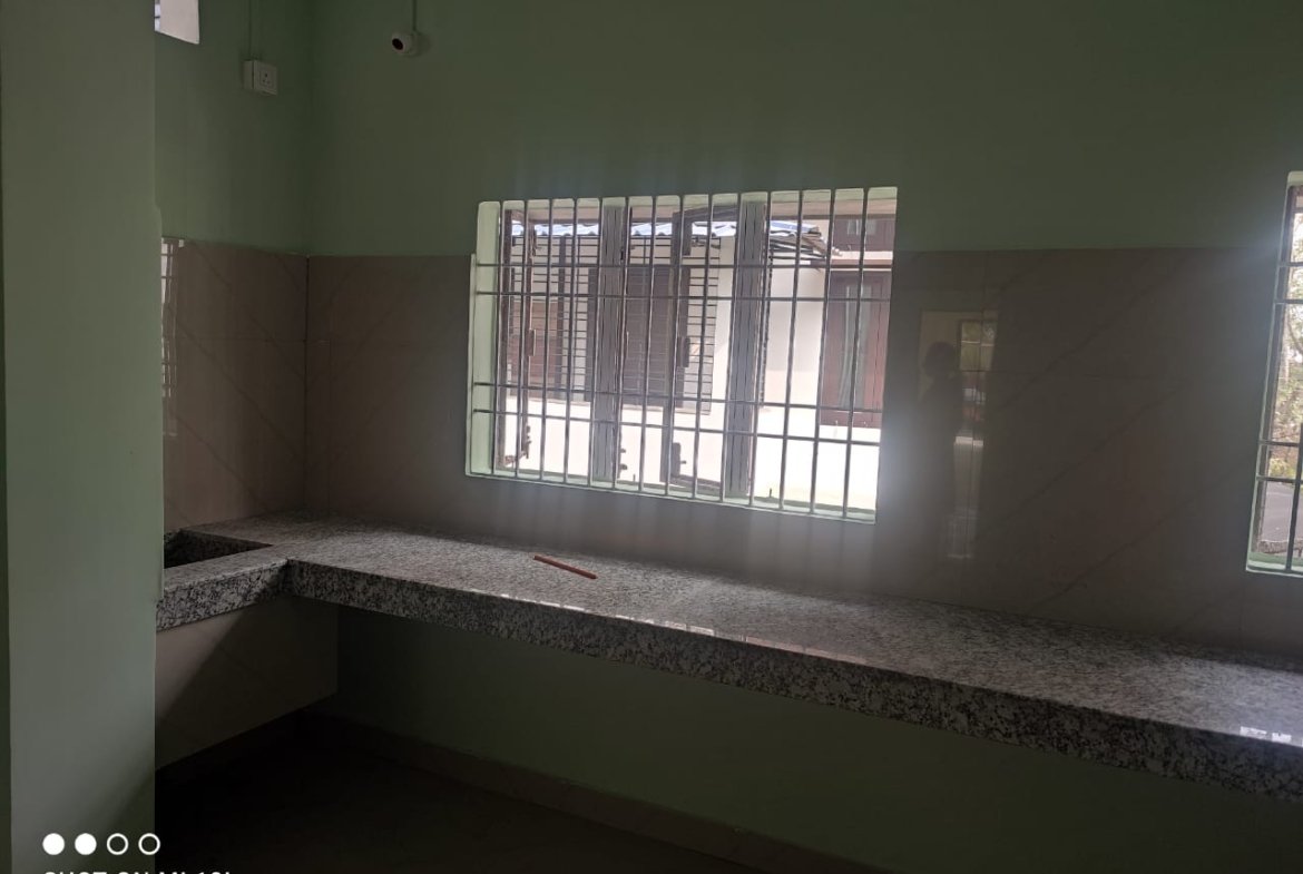 Spacious 3BHK house for rent in Milan Nagar, Dibrugarh, first-floor unit with modern design, prime location, and car parking under Rs 10,000
