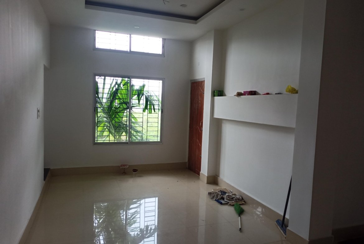 Lovely 3 BHK flat on the 1st floor in Lokhra, Guwahati, for rent under Rs 15,000, with two bathrooms and a car parking slot in a well-connected area.