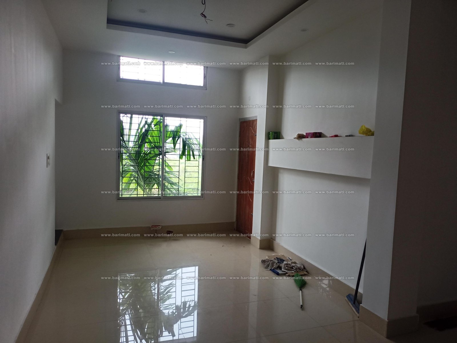 Lovely 3 BHK flat on the 1st floor in Lokhra, Guwahati, for rent under Rs 15,000, with two bathrooms and a car parking slot in a well-connected area.