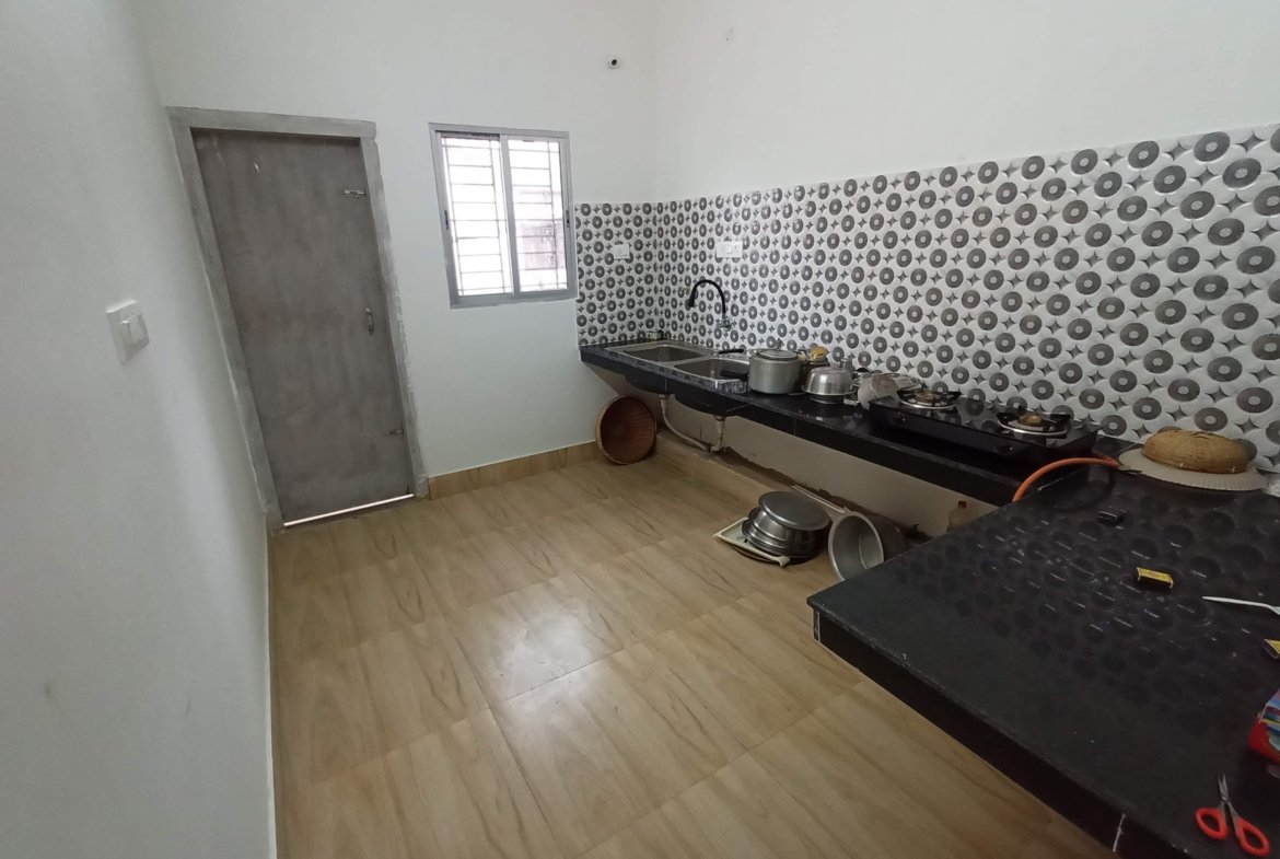 Affordable 3 BHK flat for rent in Lokhra, Guwahati, on the 1st floor with car parking and dual bathrooms, all within Rs 15,000 in a lively, prime area.