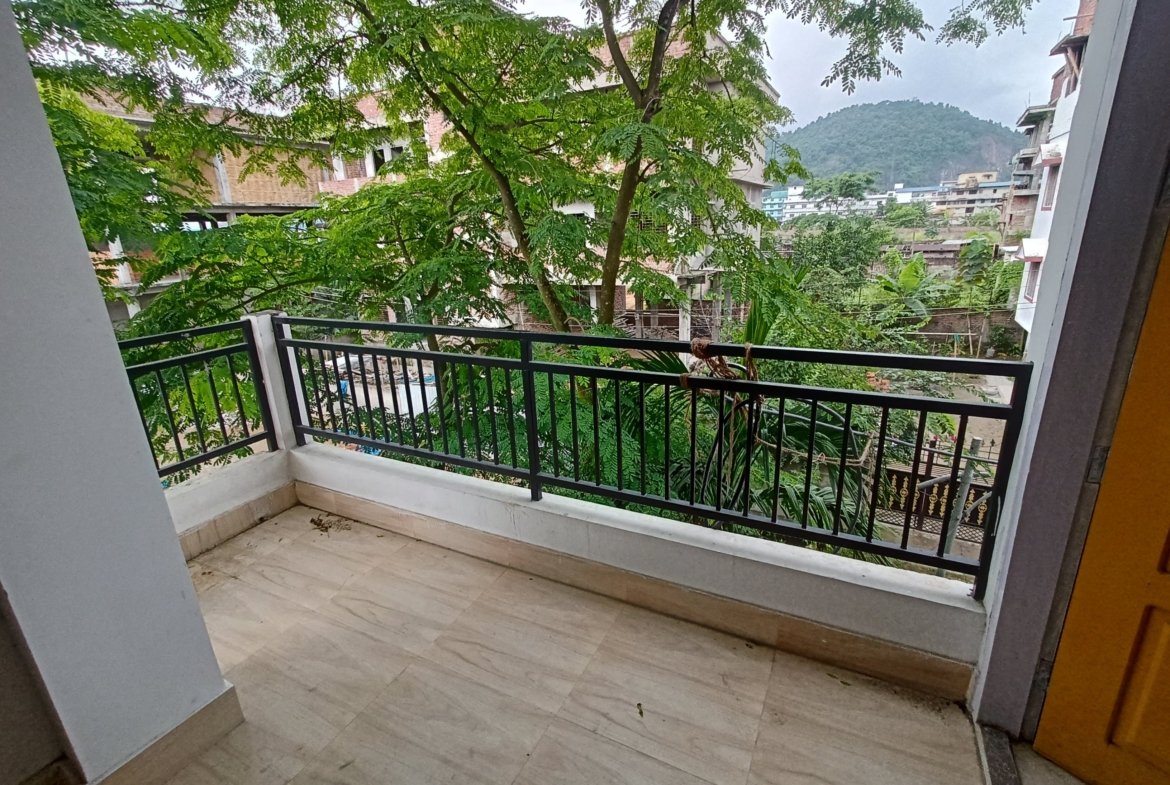 Modern 3-bedroom rental on the 1st floor in Lokhra, Guwahati, with car parking and two bathrooms, available for under Rs 15,000 in a prime city spot.
