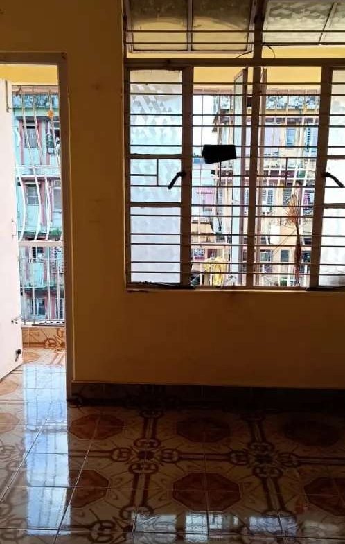 Two-room flat available for tenancy in Silchar's Mahabir Villa on Ashram Road, upper floor location, seven thousand rupees per month