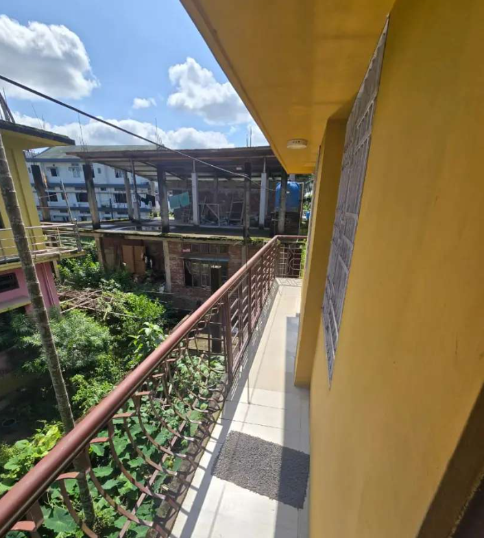 First floor independent 2-bedroom house for rent in Dibrugarh, Sankardev Railway Colony area. Close to shops and transport. Car parking available.