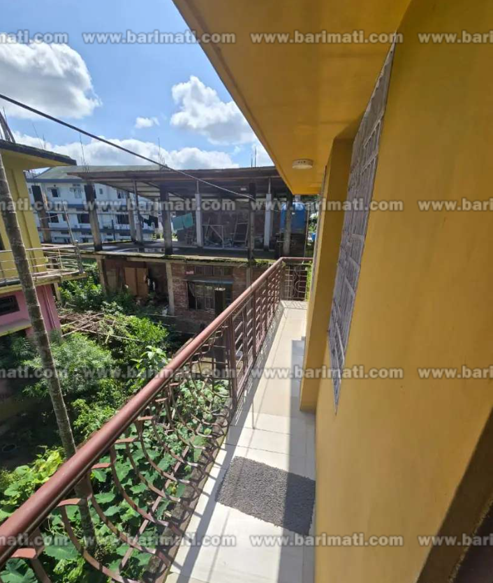 First floor independent 2-bedroom house for rent in Dibrugarh, Sankardev Railway Colony area. Close to shops and transport. Car parking available.