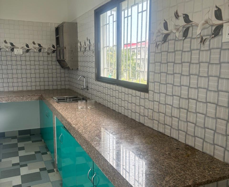 Newly built 2 BHK house for rent in Chiring Chapori, Dibrugarh. Modern style with fully tiled interiors and western bathrooms. Prime location near main road.