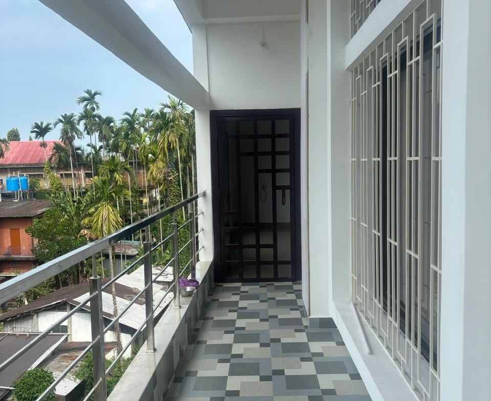 Prime Chiring Chapori! Spacious, newly built 2-bedroom house for rent in Dibrugarh. Features modern design, tiled floors, western amenities. Excellent main road location.
