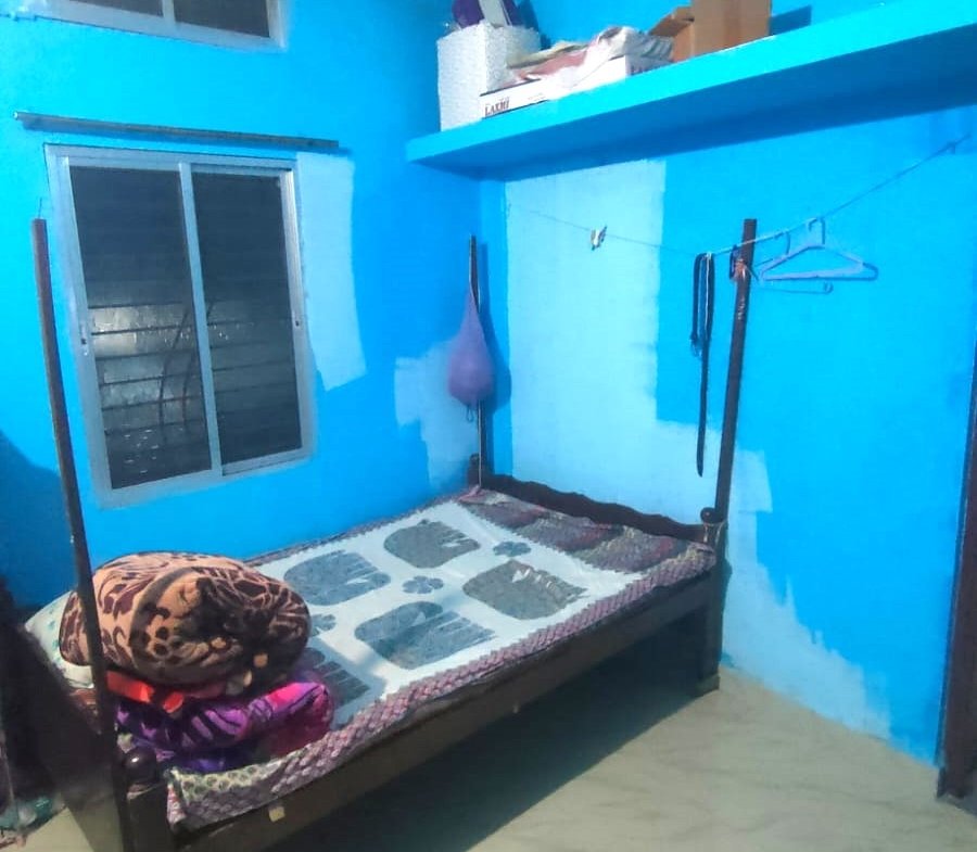 Professional rental property banner showcasing a 1 BHK house for rent near AMC and Naliapul area in Dibrugarh. The design highlights a spacious modern room with a soft fade effect, along with property details including 1 bedroom, drawing room, kitchen, bathroom, two-wheeler parking, and first-floor location. Property ID DIB135. Monthly rent is ₹8,500. Suitable for students, working professionals, and small families. The advertisement includes contact number 8099463522, website www.barimati.com, Android app information, and social media channels.