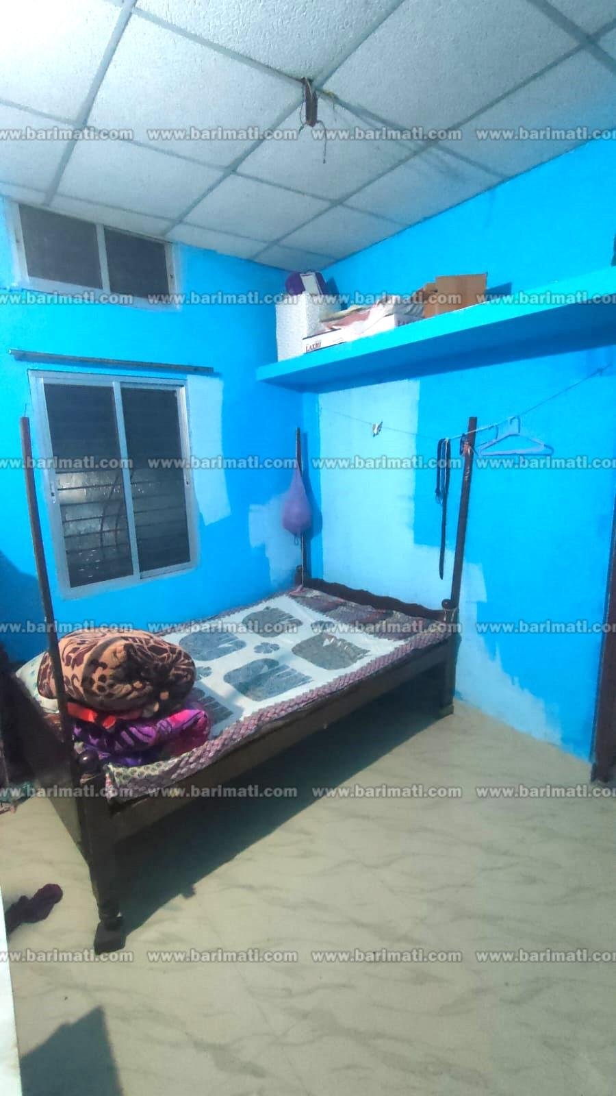 Professional rental property banner showcasing a 1 BHK house for rent near AMC and Naliapul area in Dibrugarh. The design highlights a spacious modern room with a soft fade effect, along with property details including 1 bedroom, drawing room, kitchen, bathroom, two-wheeler parking, and first-floor location. Property ID DIB135. Monthly rent is ₹8,500. Suitable for students, working professionals, and small families. The advertisement includes contact number 8099463522, website www.barimati.com, Android app information, and social media channels.